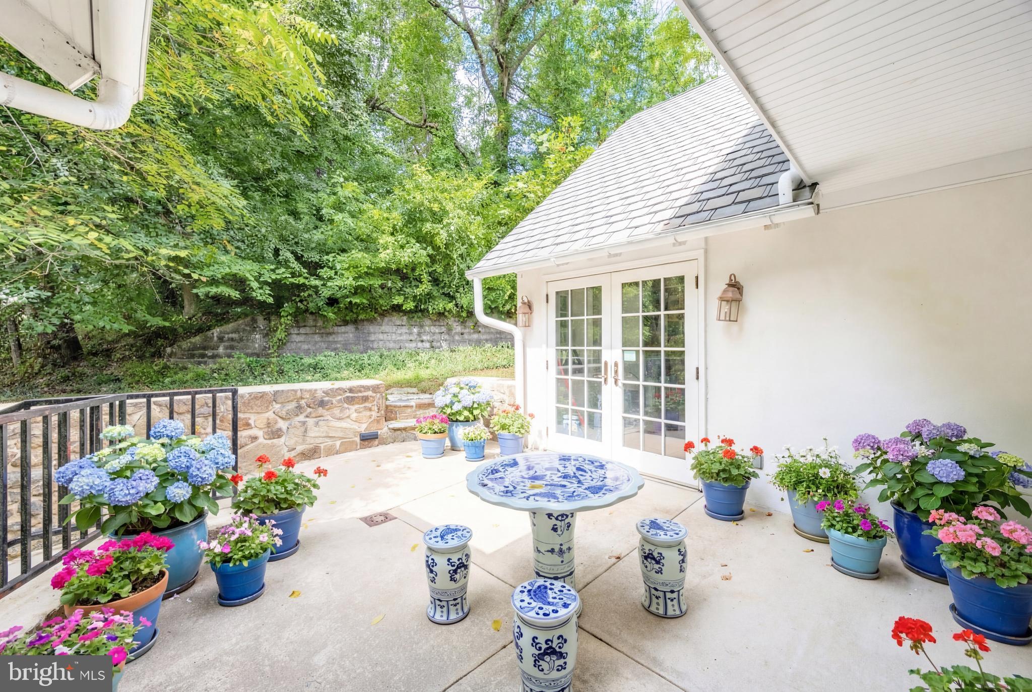 580 Reeds Road Downingtown, PA 19335 - Photo 64 of 82 a front view of a house with a garden and patio