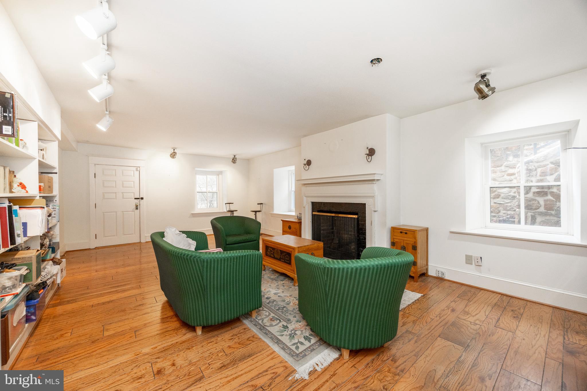 580 Reeds Road Downingtown, PA 19335 - Photo 7 of 82 a living room with furniture and a fireplace