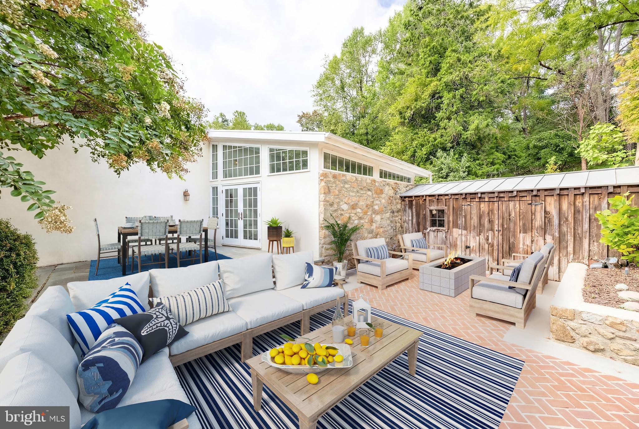 580 Reeds Road Downingtown, PA 19335 - Photo 76 of 82 a view of a patio with couches chairs and a wooden floor