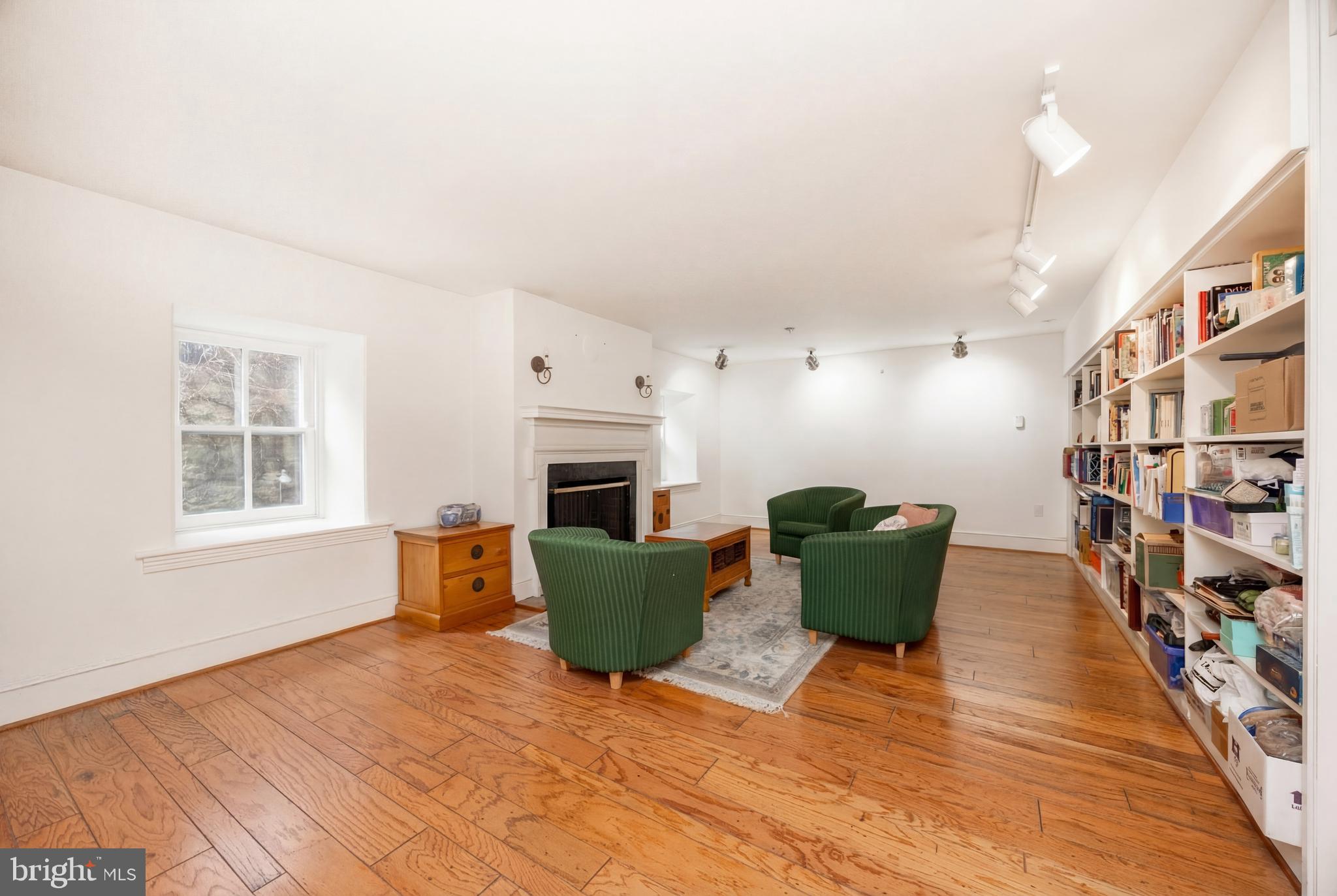 580 Reeds Road Downingtown, PA 19335 - Photo 8 of 82 a living room with furniture and a fireplace