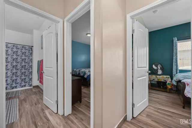 a view of a bedroom from a hallway