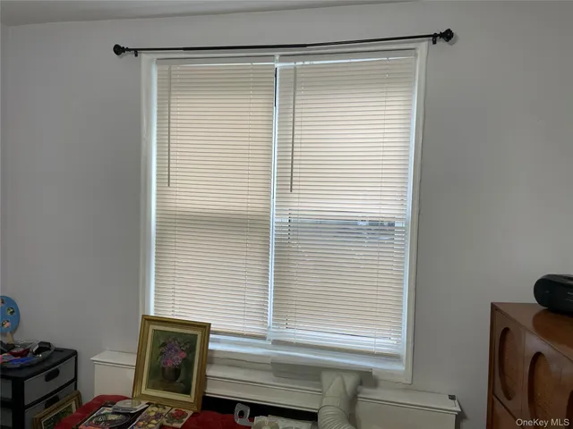 a view of a window and a small space