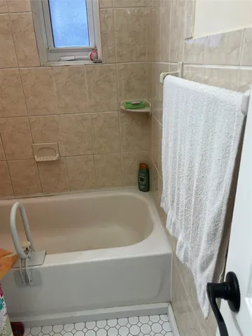a bathroom with a bathtub