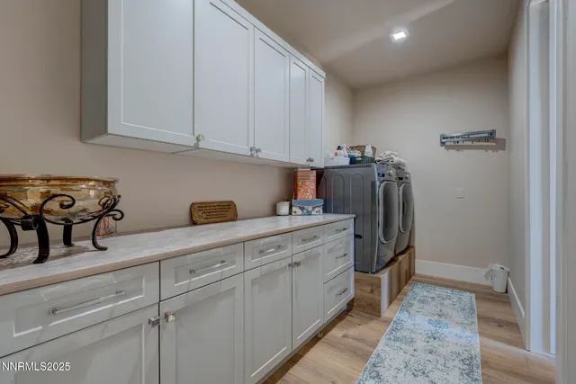 a bedroom with a bed and a mirror