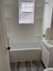 a bathroom with a bathtub