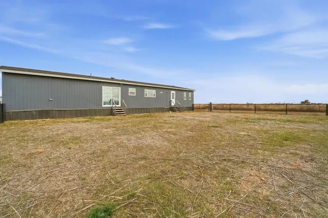 a front view of house with yard