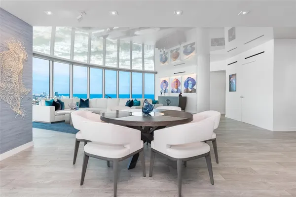 a view of a dining room and livingroom view