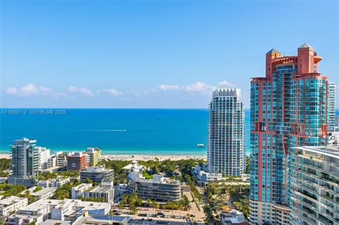a view of city with tall buildings