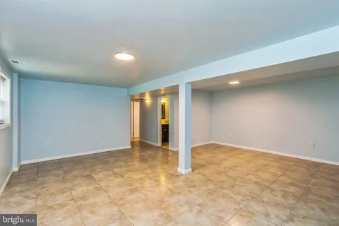 an empty room with natural light