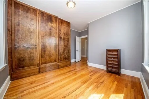 a view of an empty room with glass door