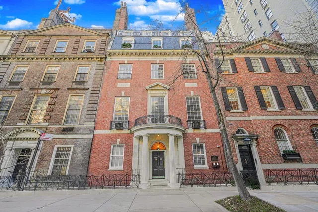 a front view of a multi story residential apartment building