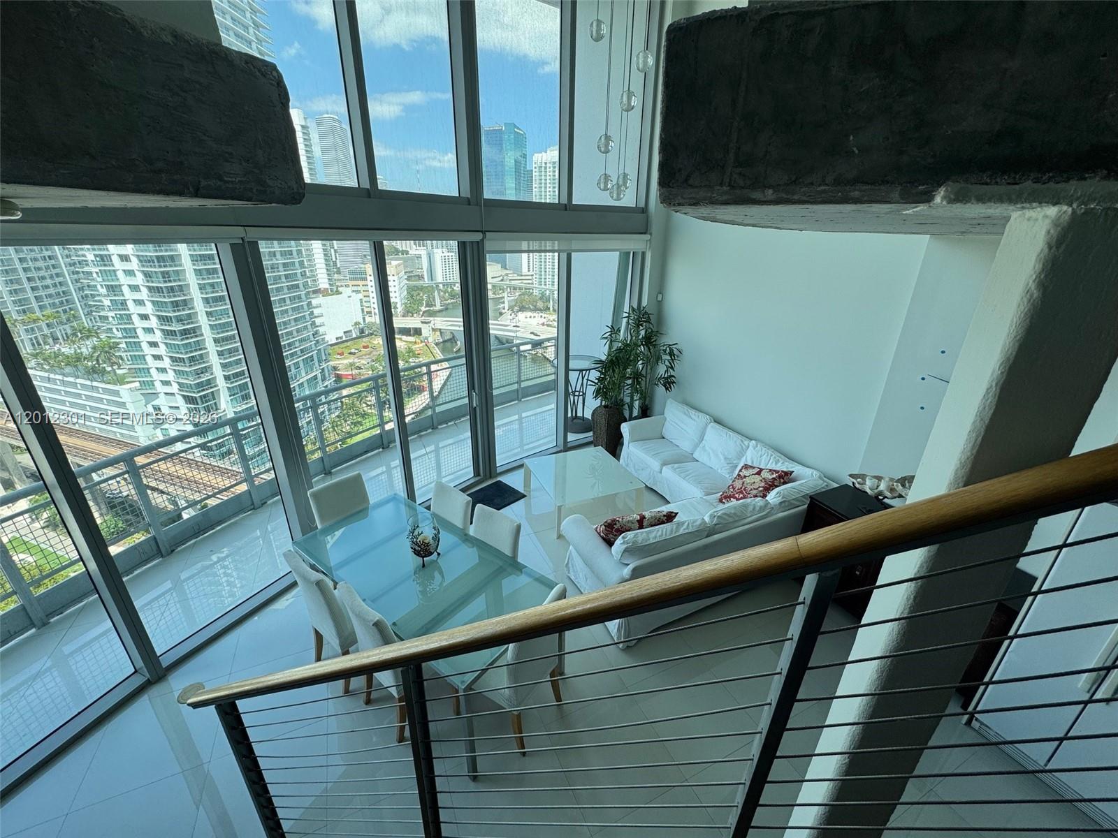 690 Southwest 1st Court, Unit 2301 Miami, FL 33130 - Photo 7 of 26 a view of balcony and furniture