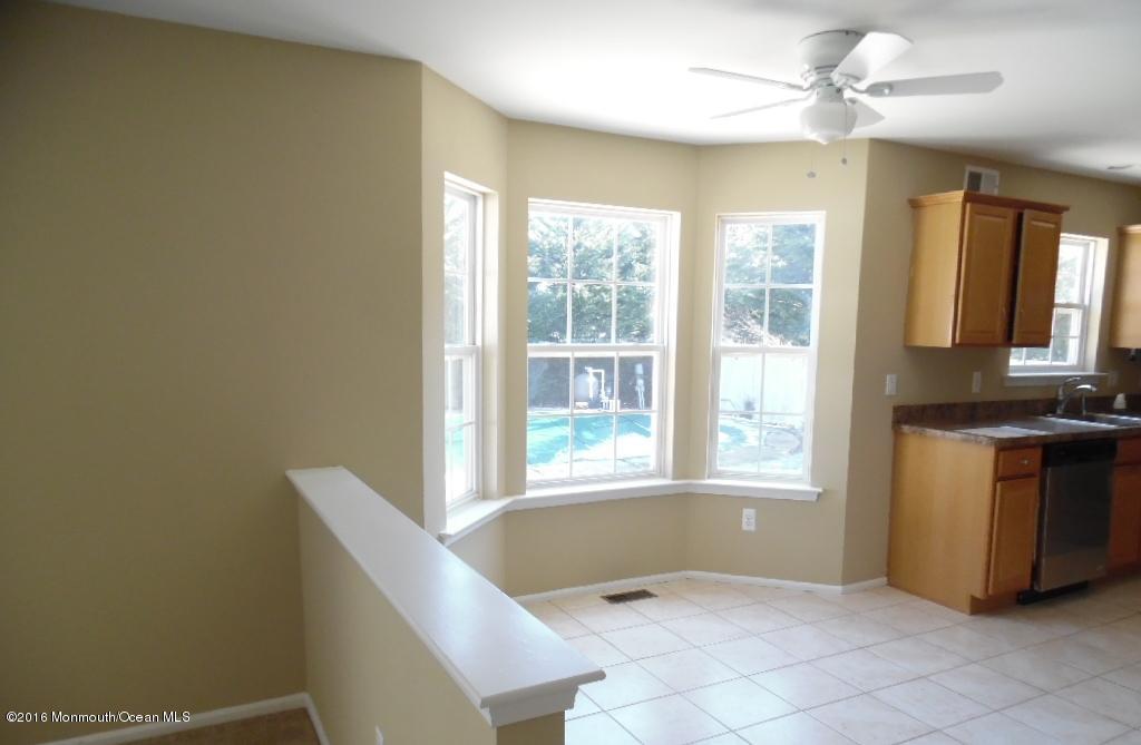 116 Lanyard Road Manahawkin, NJ 08050 - Photo 3 of 11 a living room with a large window