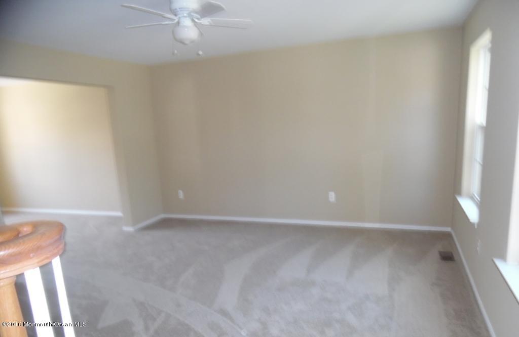 116 Lanyard Road Manahawkin, NJ 08050 - Photo 9 of 11 a view of an empty room