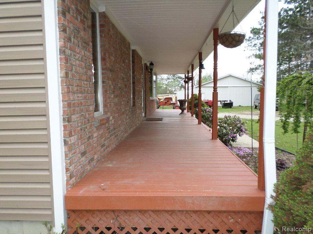5335 Pyles Road Columbiaville, MI 48421 - Photo 4 of 27 Covered Front Porch.jpg