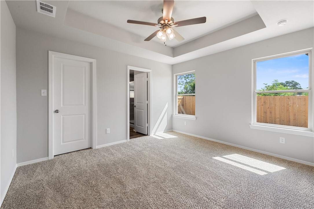 2869 Messenger Way Bryan, TX 77803 - Photo 13 of 23 a view of a big room with windows and closet