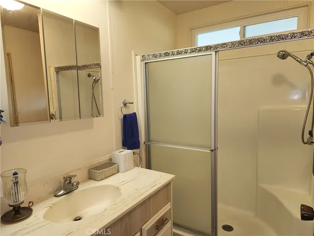 a room with furniture and musical instruments