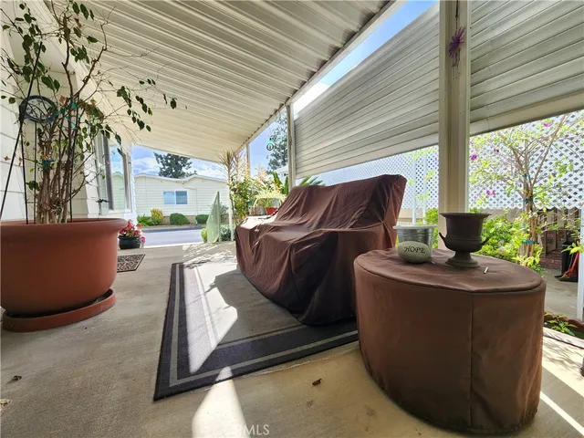 a living room with couches and a fireplace