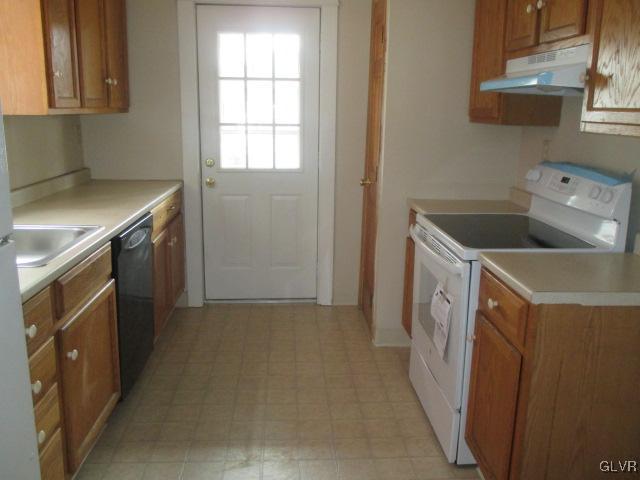 1037 Spring Street Bethlehem, PA 18018 - Photo 4 of 11 a utility room with a sink a washer and dryer