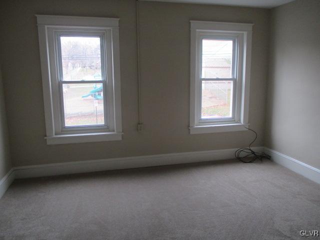1037 Spring Street Bethlehem, PA 18018 - Photo 5 of 11 an empty room with a window