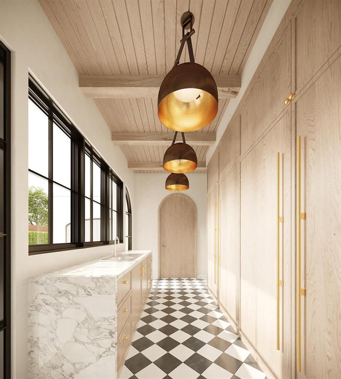 6823 Norway Road Dallas, TX 75230 - Photo 4 of 10 a view of a hallway with wooden floor and chandelier