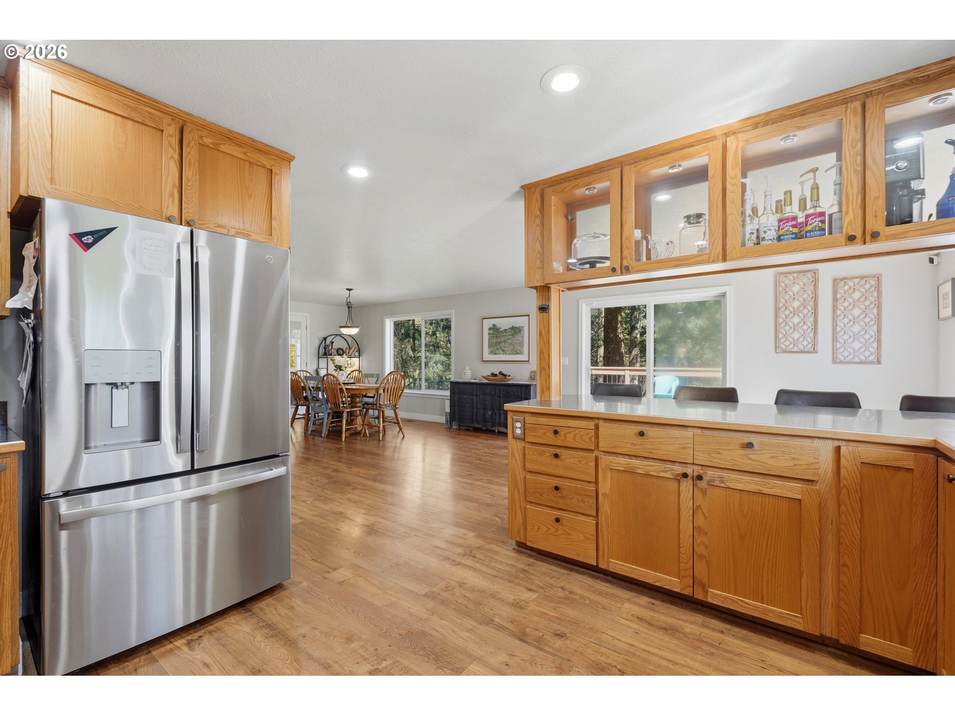 23032 Northeast Hagey Road Dundee, OR 97115 - Photo 12 of 42 a kitchen with stainless steel appliances granite countertop a refrigerator a stove and a sink