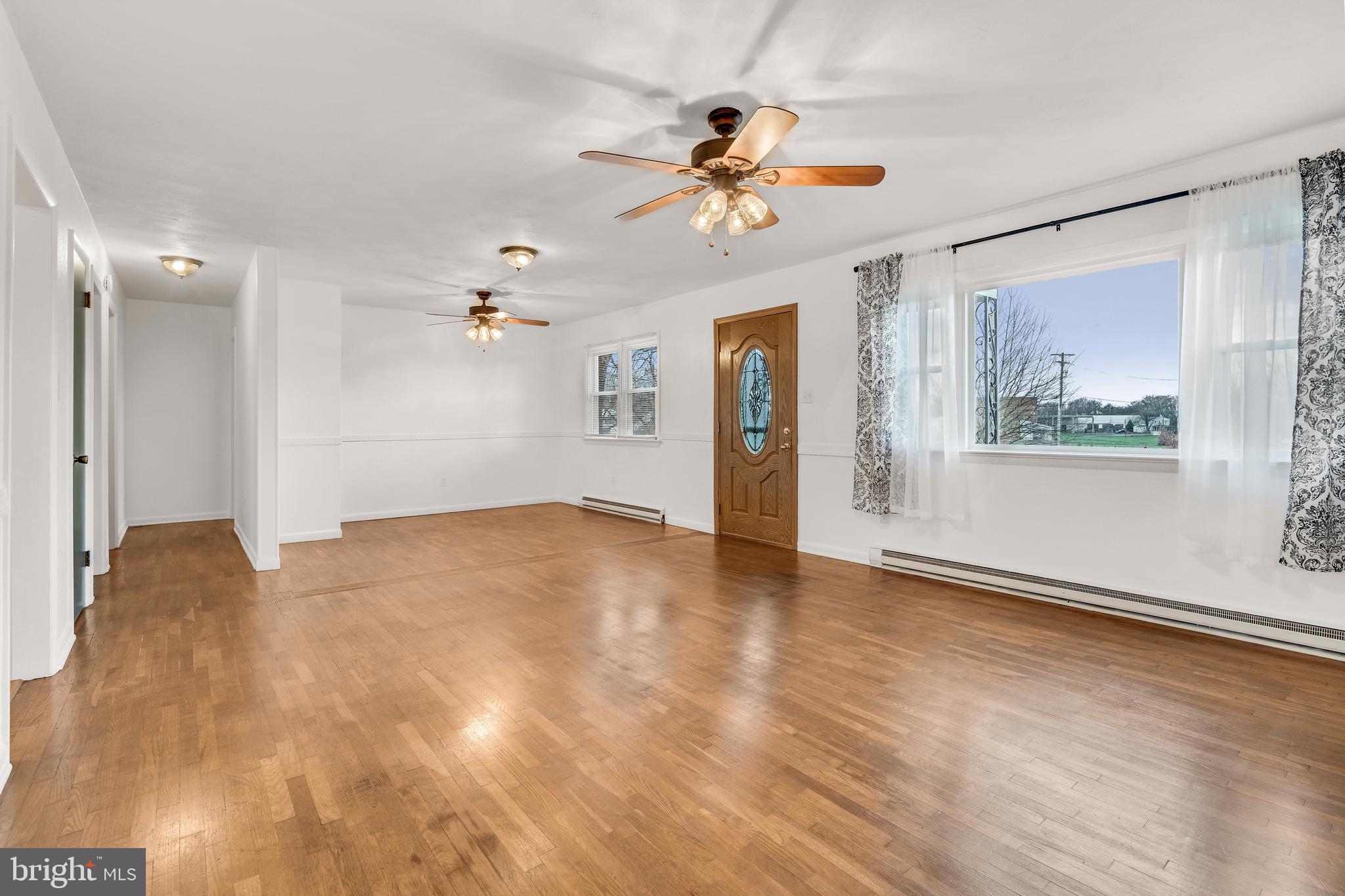 310 North Fairfax Boulevard Ranson, WV 25438 - Photo 12 of 36 a view of empty room with wooden floor