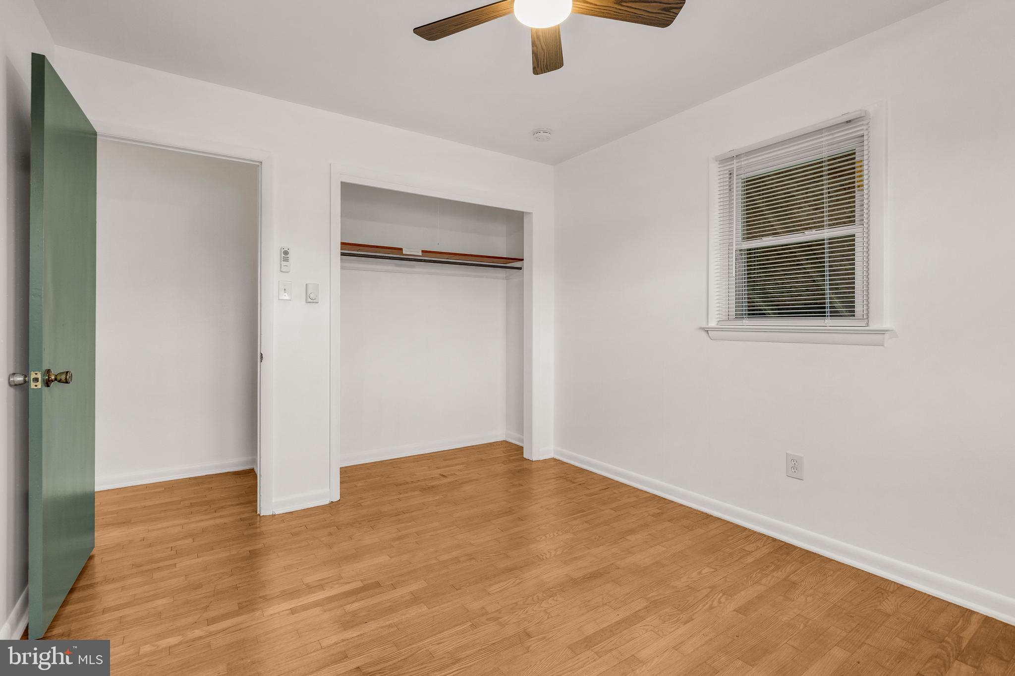 310 North Fairfax Boulevard Ranson, WV 25438 - Photo 22 of 36 wooden floor in an empty room with a window
