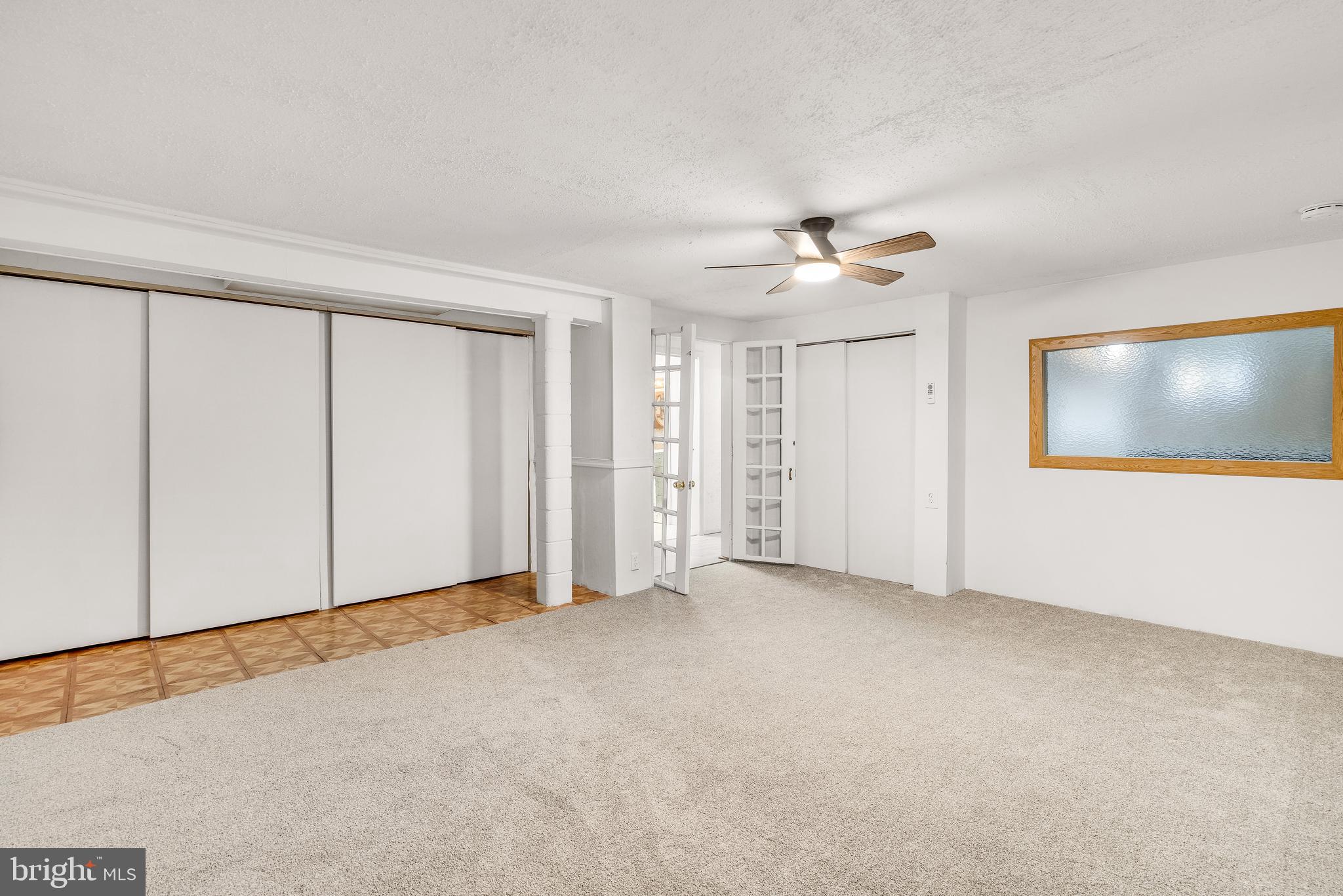 310 North Fairfax Boulevard Ranson, WV 25438 - Photo 27 of 36 an empty room with fan and windows