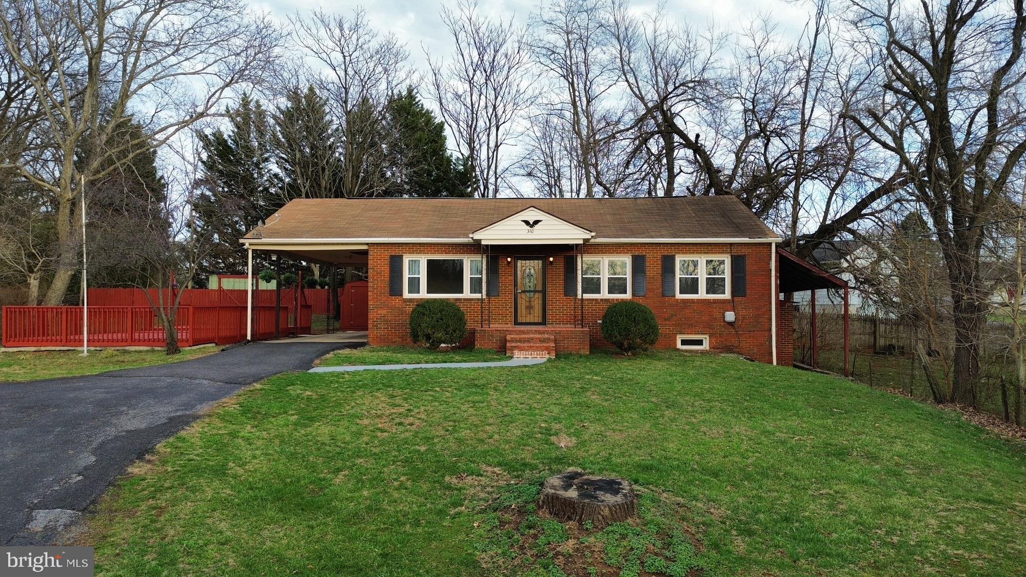 310 North Fairfax Boulevard Ranson, WV 25438 - Photo 35 of 36 a front view of a house with a yard