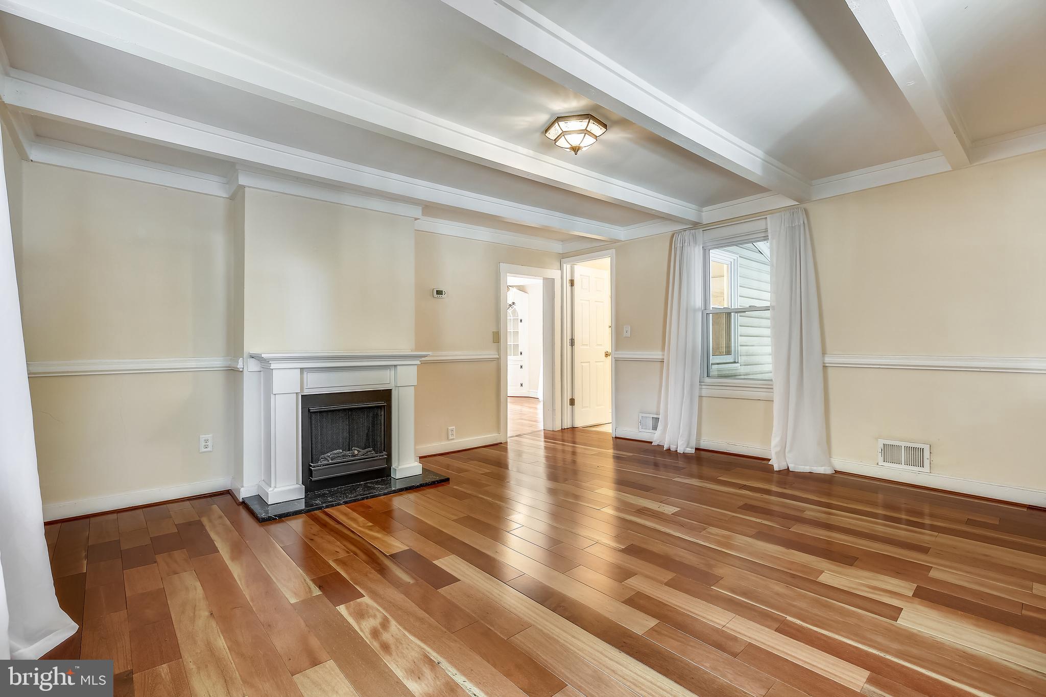 411 Baltimore Road Rockville, MD 20850 - Photo 5 of 48 LivingRm BEAMED Ceilings *FP*Brazilian Hardwoods