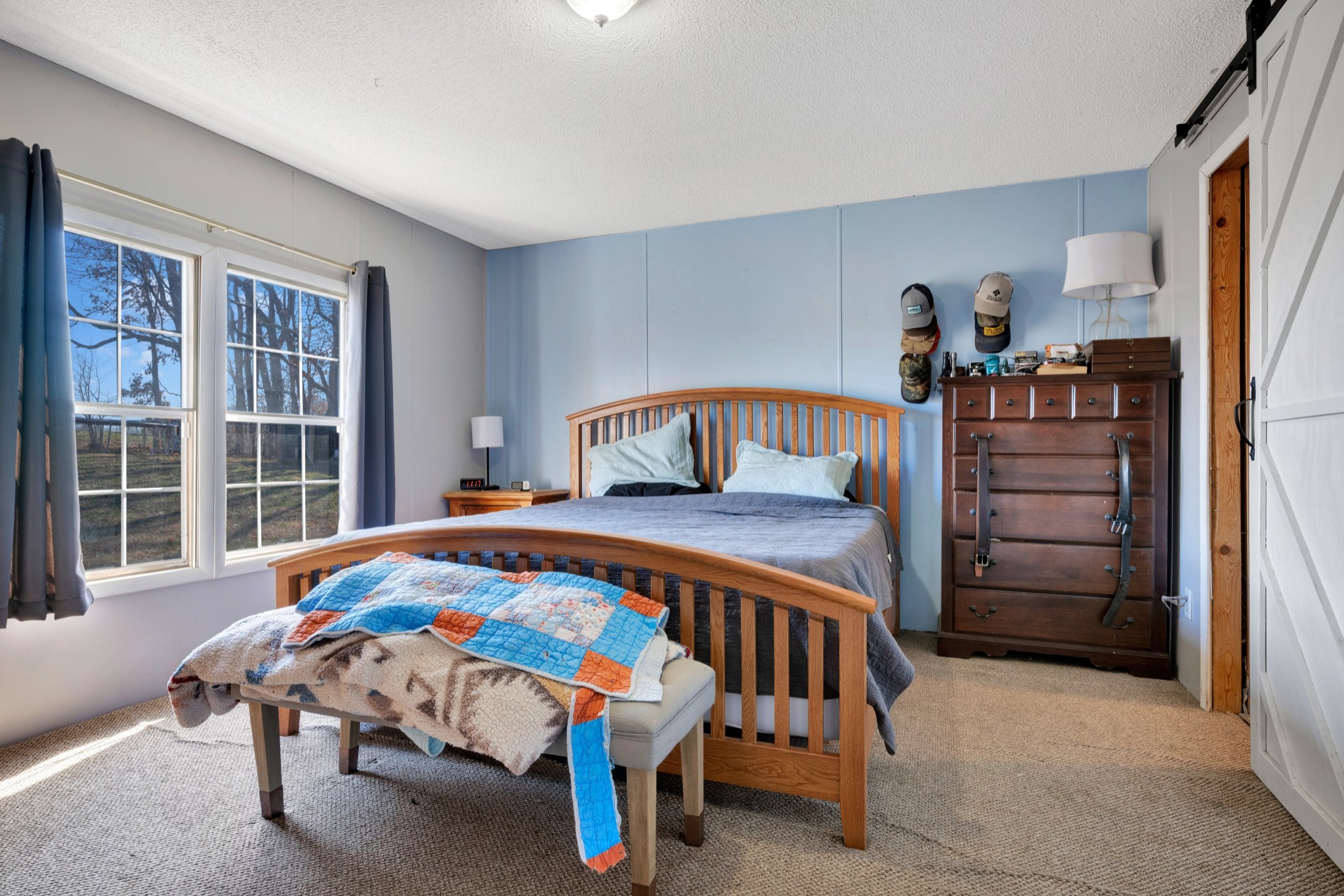 1169 Saddle Tree Road Ashland City, TN 37015 - Photo 11 of 29 a bedroom with a bed and a window