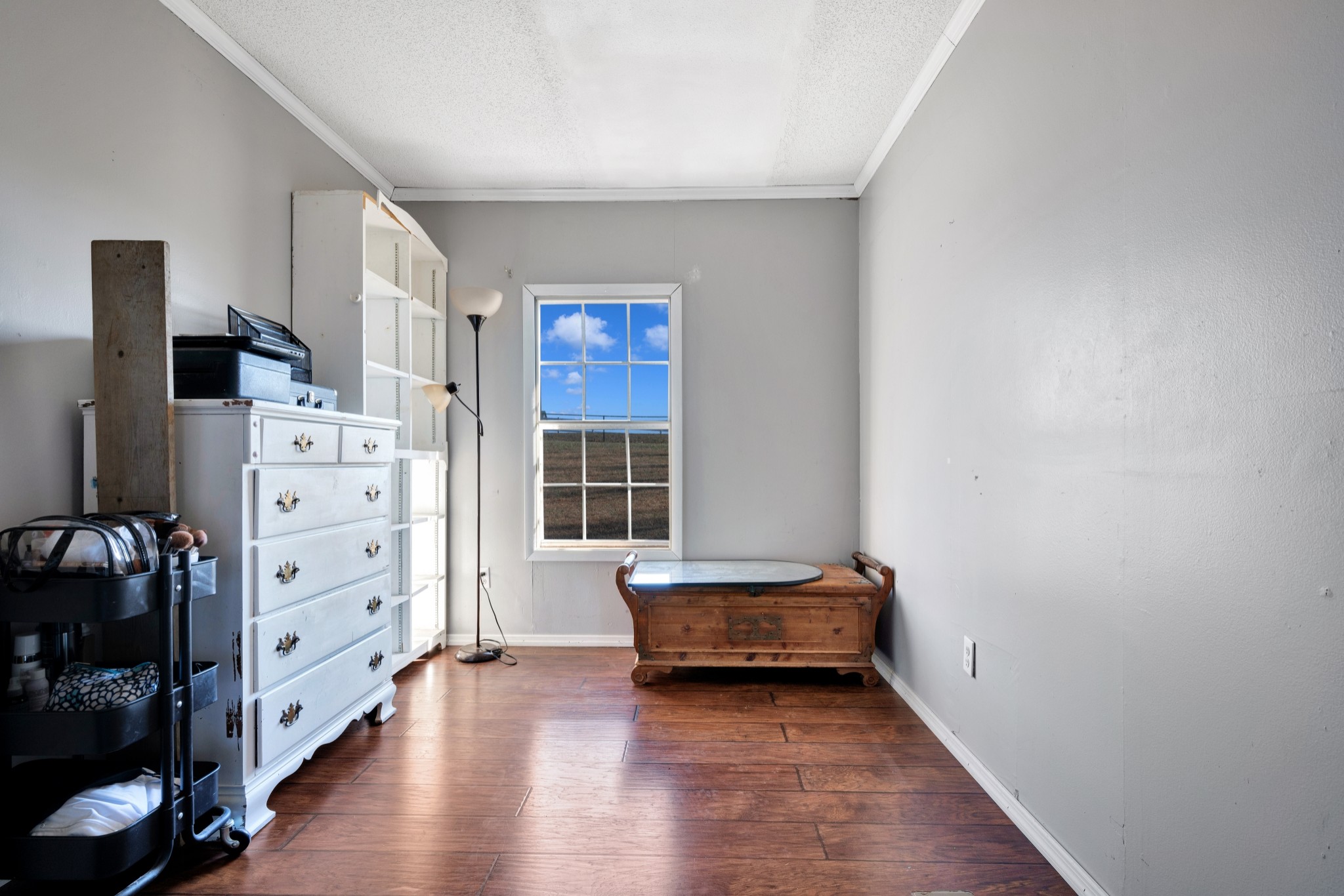 1169 Saddle Tree Road Ashland City, TN 37015 - Photo 15 of 29 a view of room with wooden floor and cabinet