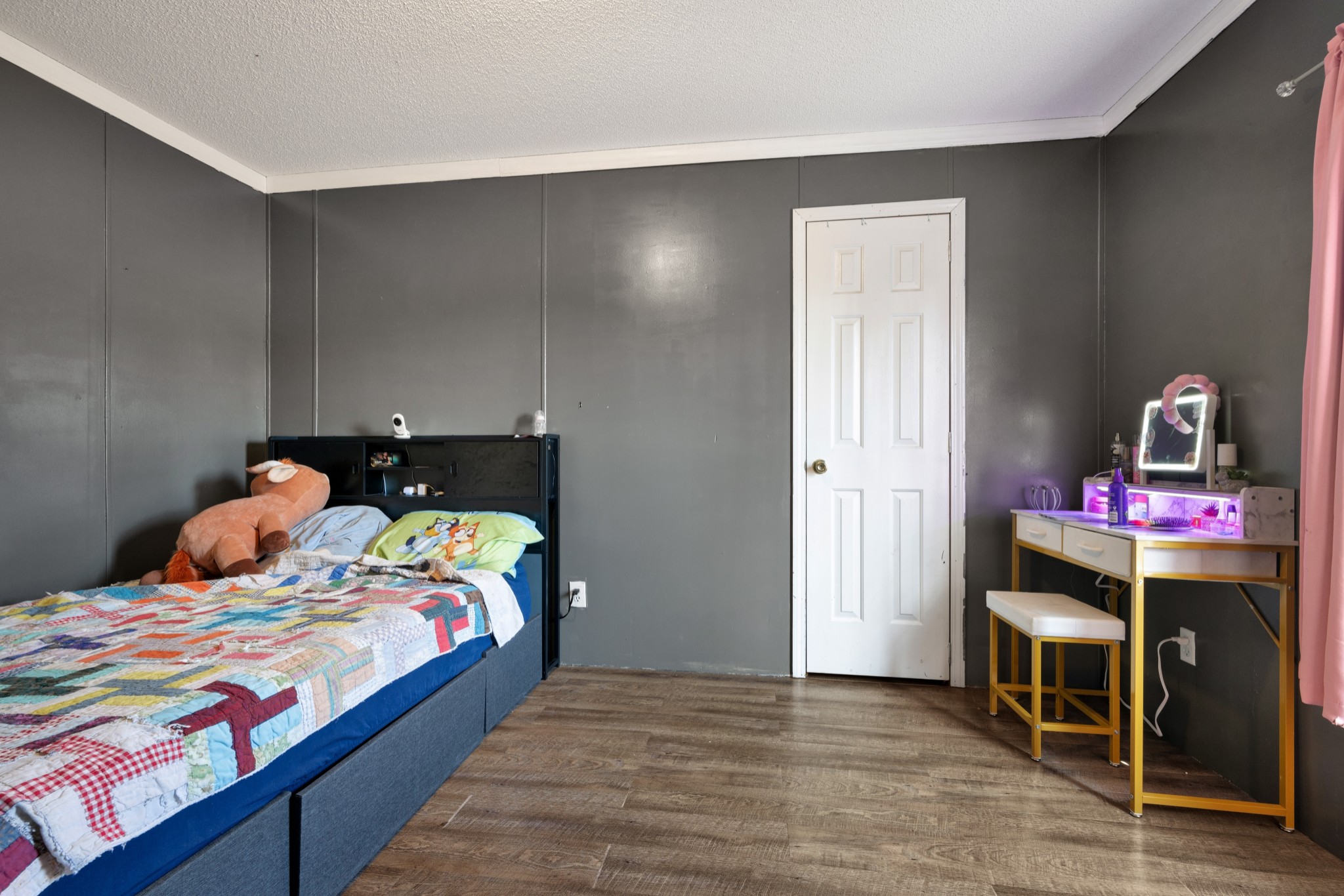 1169 Saddle Tree Road Ashland City, TN 37015 - Photo 18 of 29 a bedroom with a bed and wooden floor