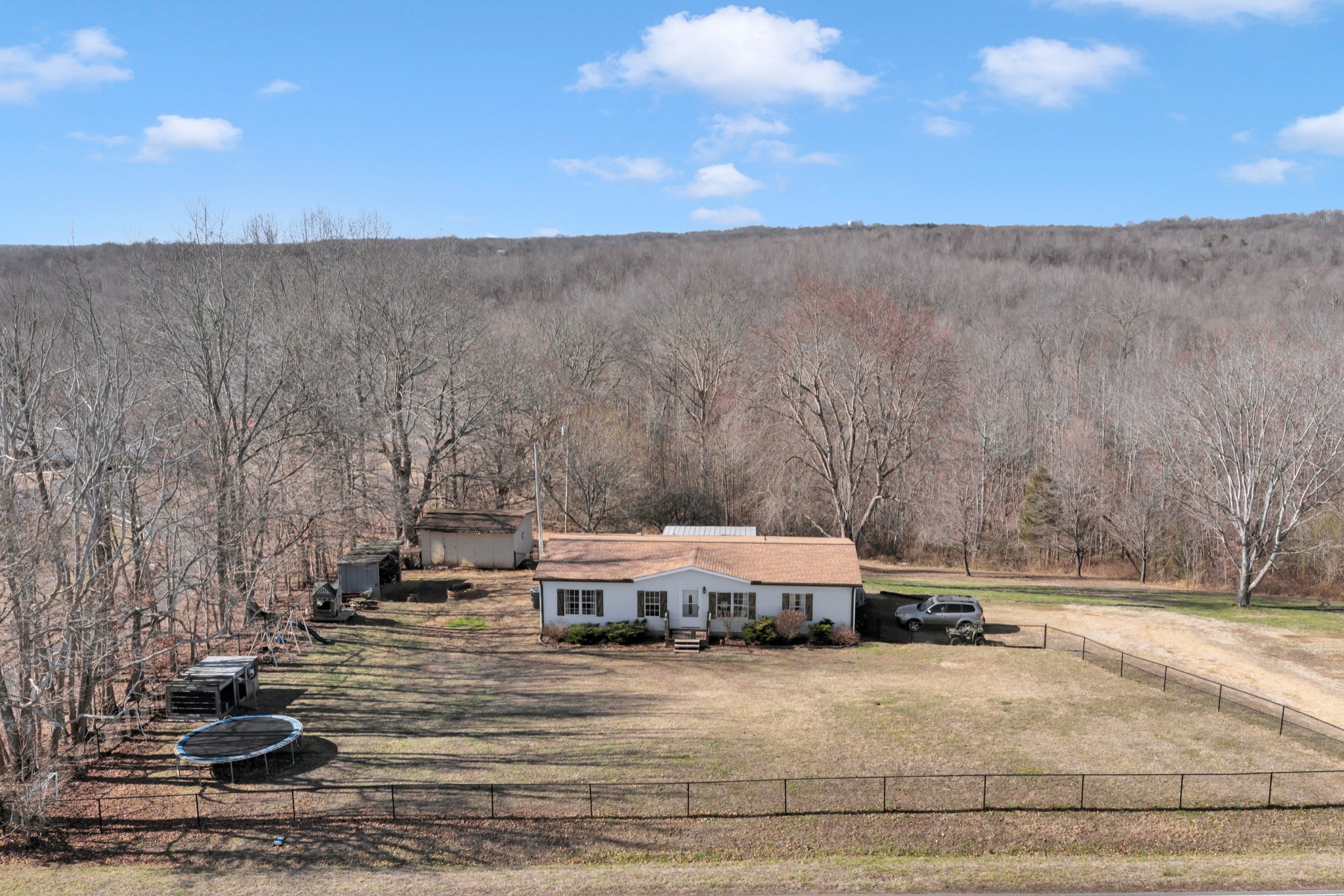1169 Saddle Tree Road Ashland City, TN 37015 - Photo 2 of 29 a view of a house with a yard
