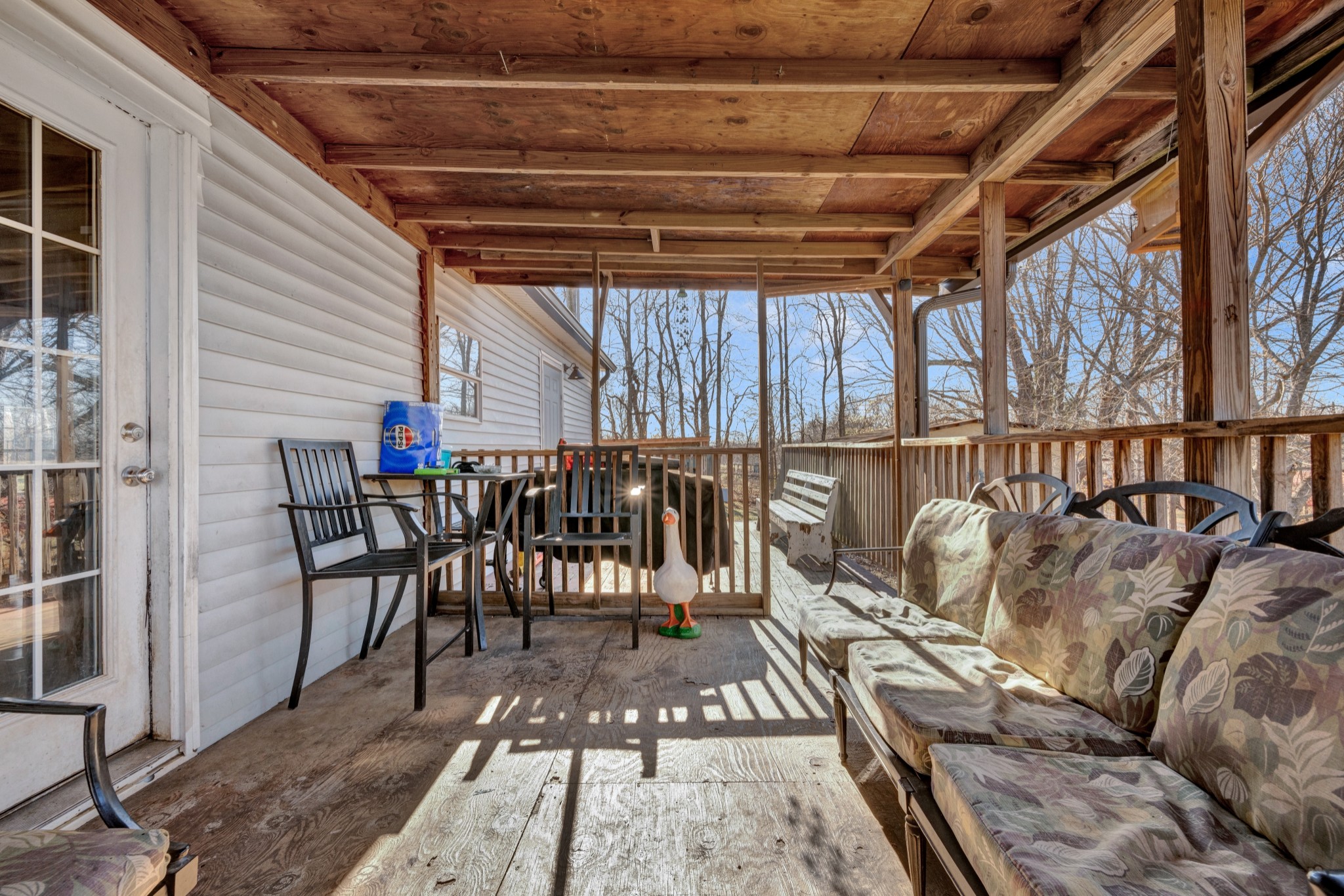 1169 Saddle Tree Road Ashland City, TN 37015 - Photo 23 of 29 a view of a chairs and table in the patio