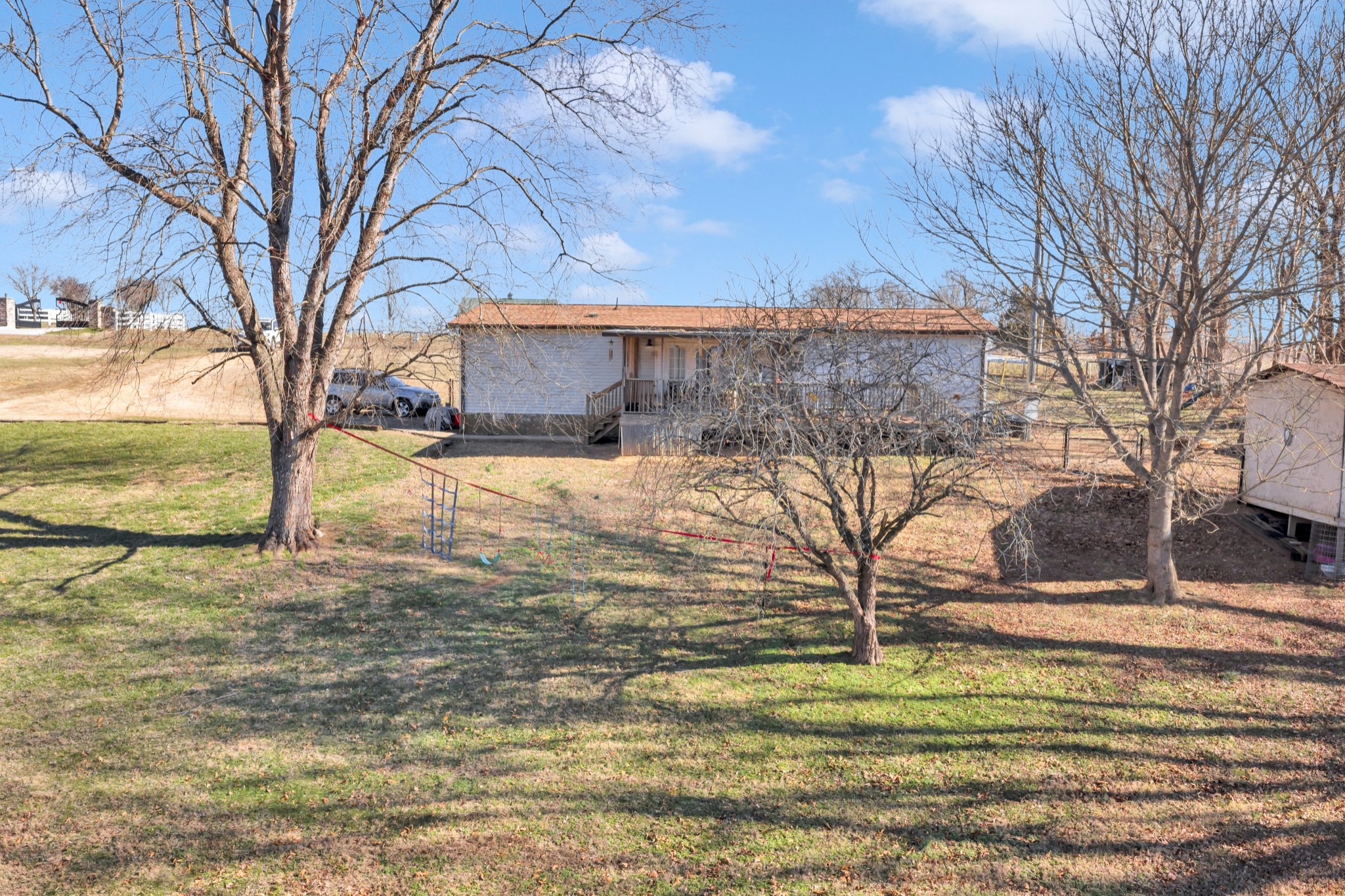 1169 Saddle Tree Road Ashland City, TN 37015 - Photo 27 of 29 a view of a yard with large trees
