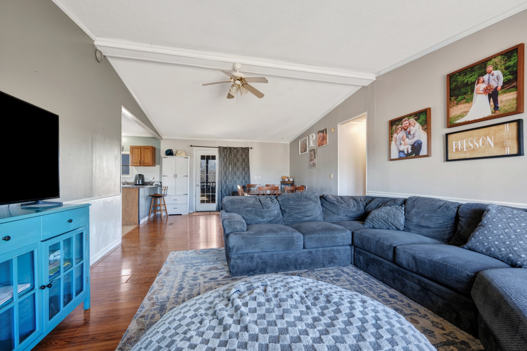 1169 Saddle Tree Road Ashland City, TN 37015 - Photo 5 of 29 a living room with furniture and a flat screen tv