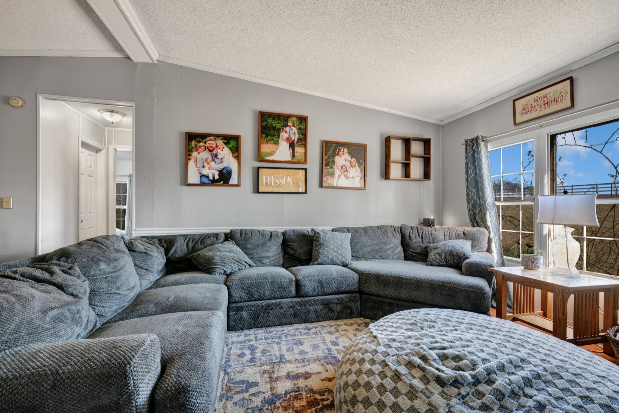 1169 Saddle Tree Road Ashland City, TN 37015 - Photo 6 of 29 a living room with furniture and a couch