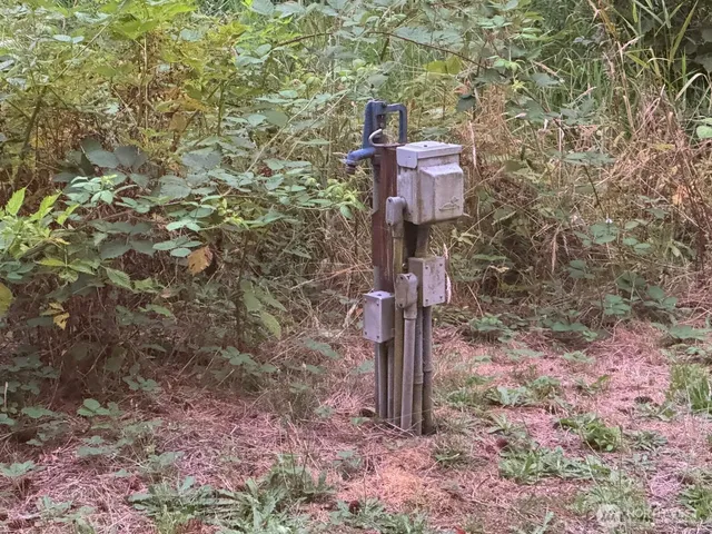 a brick building with a tree in front of it