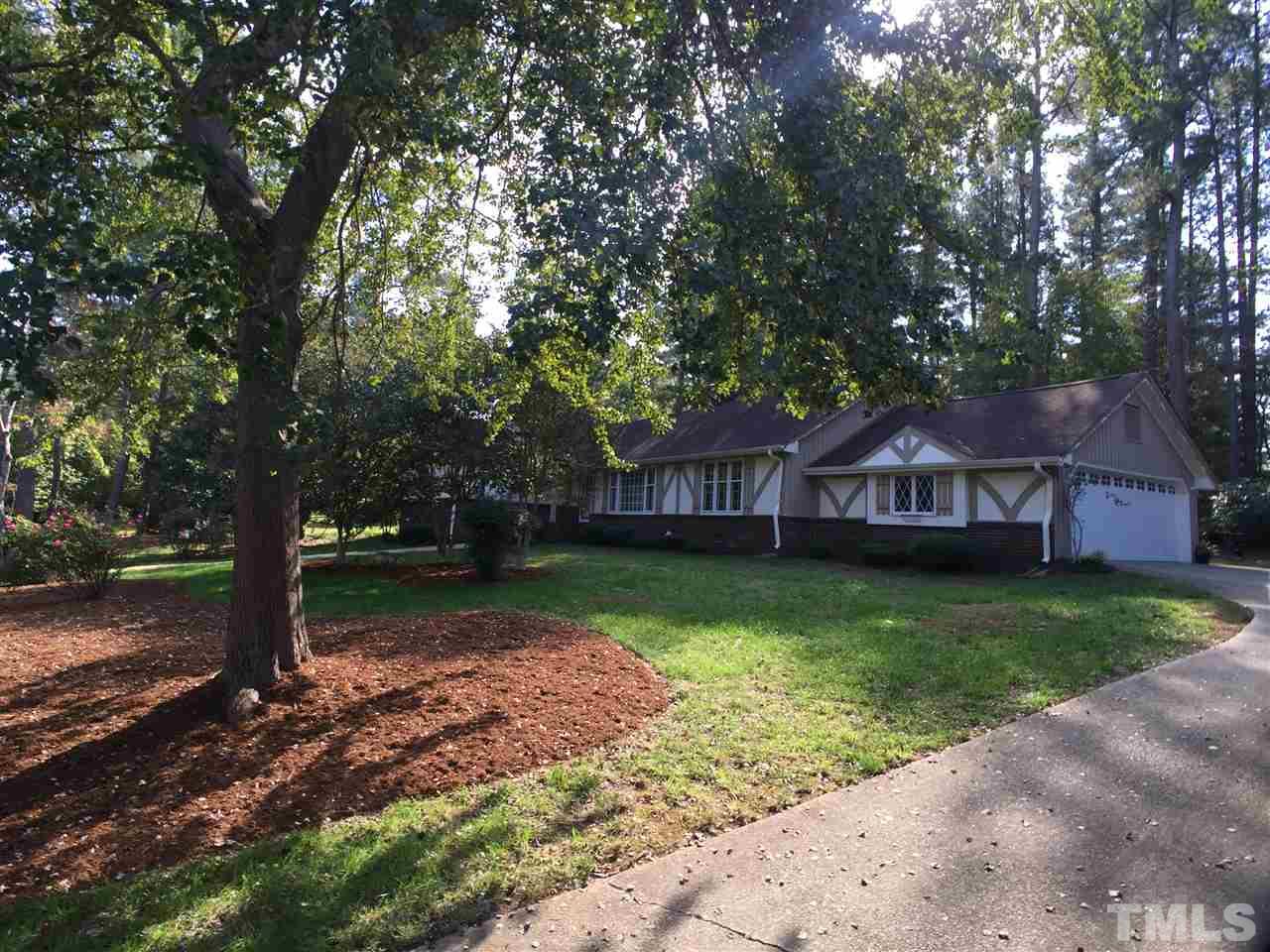 3105 Braddock Drive Raleigh, NC 27612 - Photo 1 of 19 a view of a house with a yard