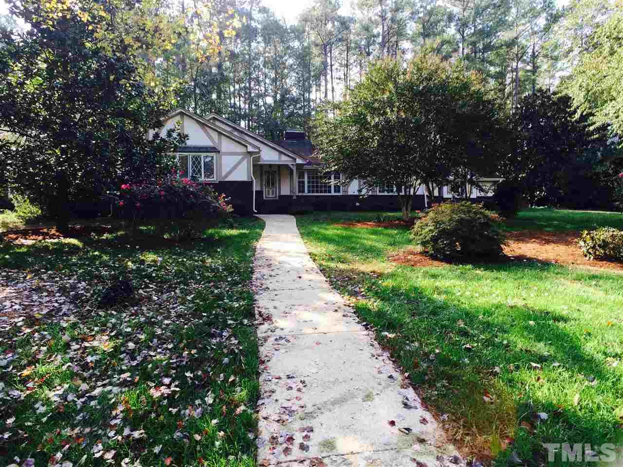 3105 Braddock Drive Raleigh, NC 27612 - Photo 2 of 19 a front view of a house with garden
