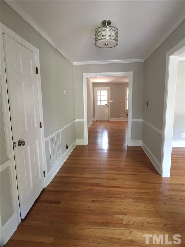 3105 Braddock Drive Raleigh, NC 27612 - Photo 5 of 19 a view of gallery with wooden floor