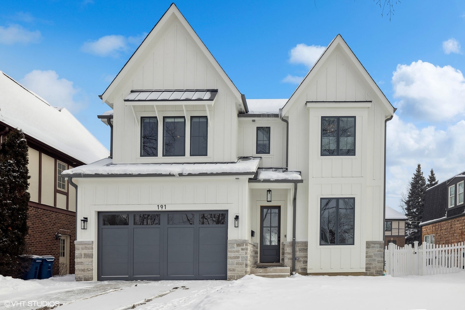 191 Rex Boulevard Elmhurst, IL 60126 - Photo 1 of 20 a view of a white house with a large windows
