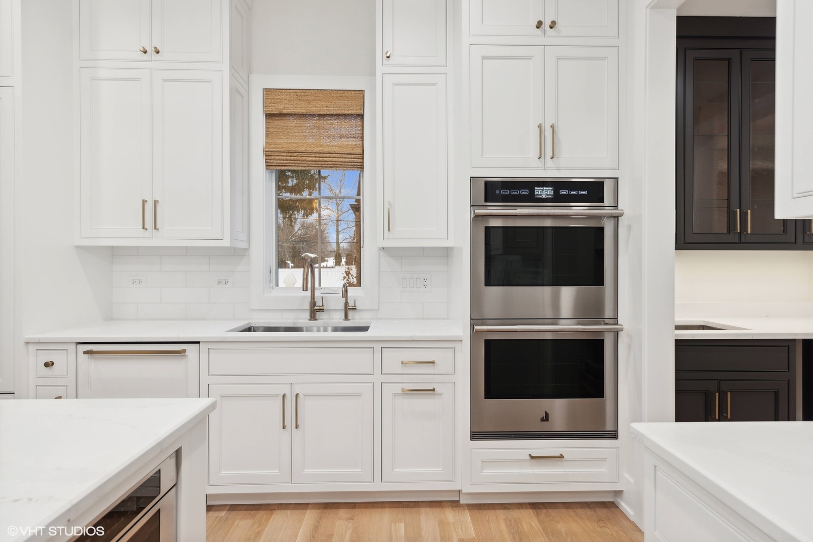 191 Rex Boulevard Elmhurst, IL 60126 - Photo 4 of 20 a kitchen with white cabinets and stainless steel appliances