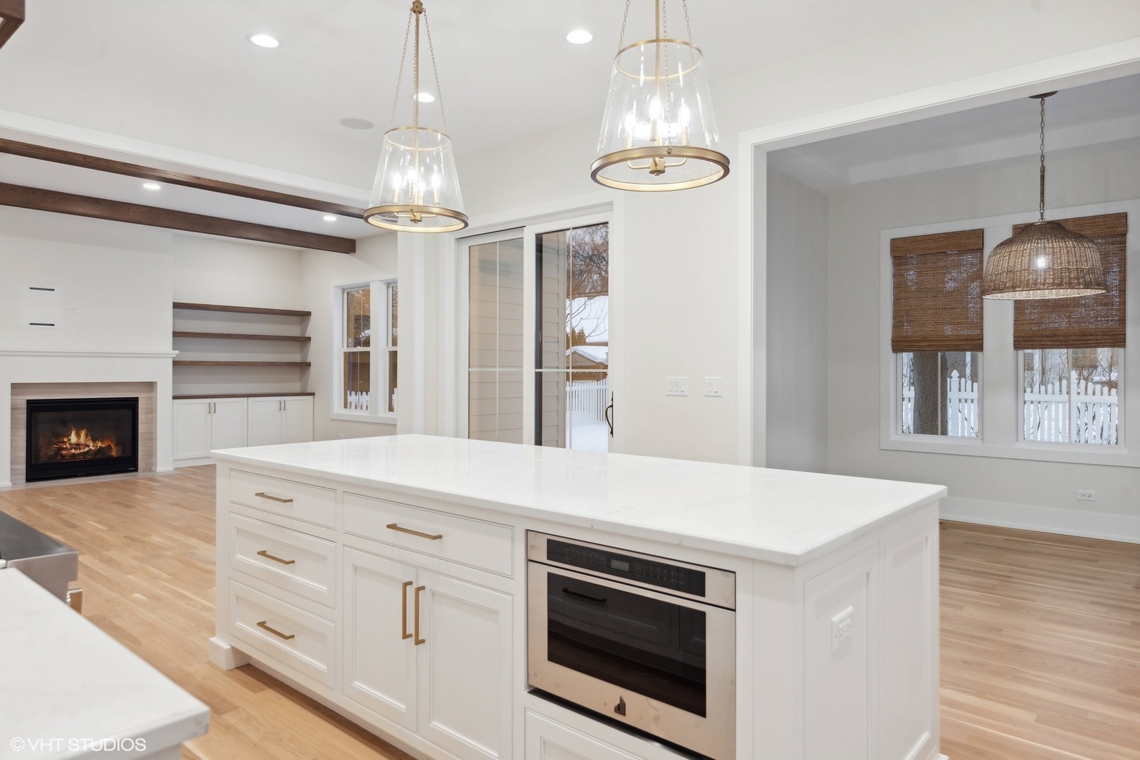 191 Rex Boulevard Elmhurst, IL 60126 - Photo 5 of 20 a kitchen with stainless steel appliances a stove top oven and a chandelier