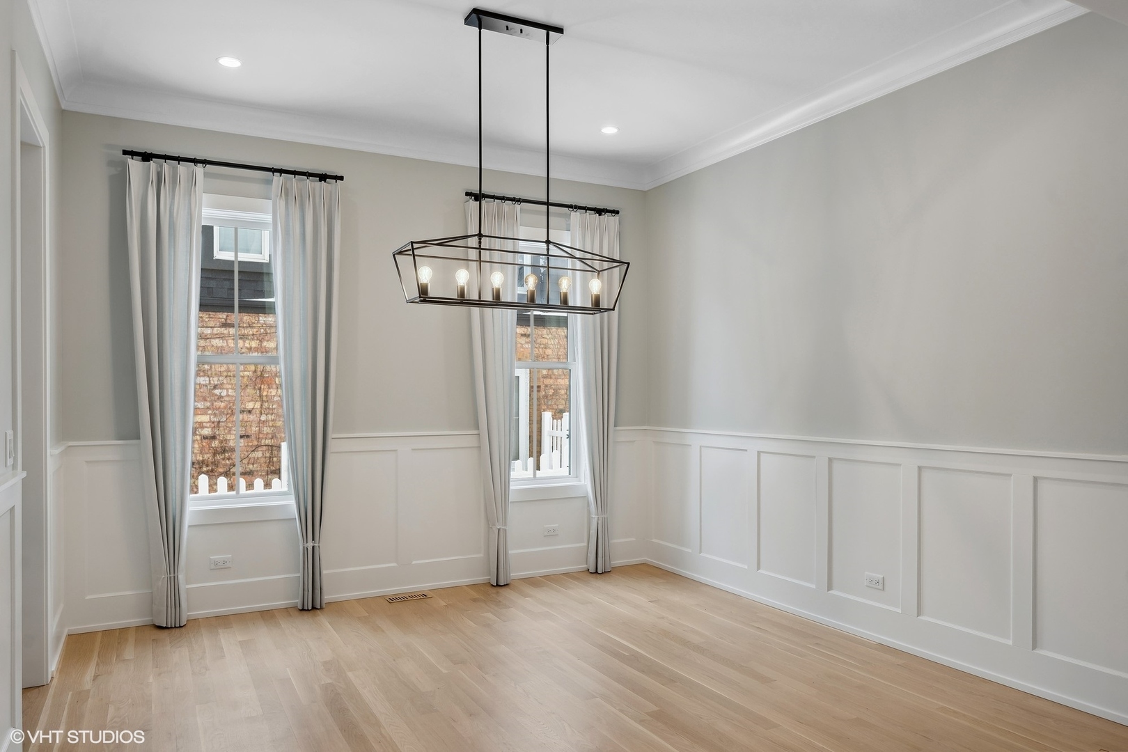 191 Rex Boulevard Elmhurst, IL 60126 - Photo 8 of 20 a view of empty room with wooden floor and fan