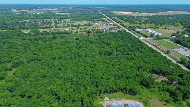 an aerial view of a city with lots of residential buildings
