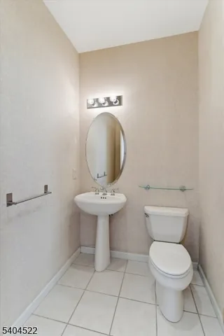 a view of a livingroom with an empty space and a flat screen tv