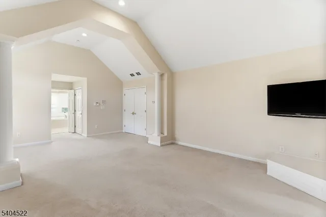 an empty room with a empty space and window